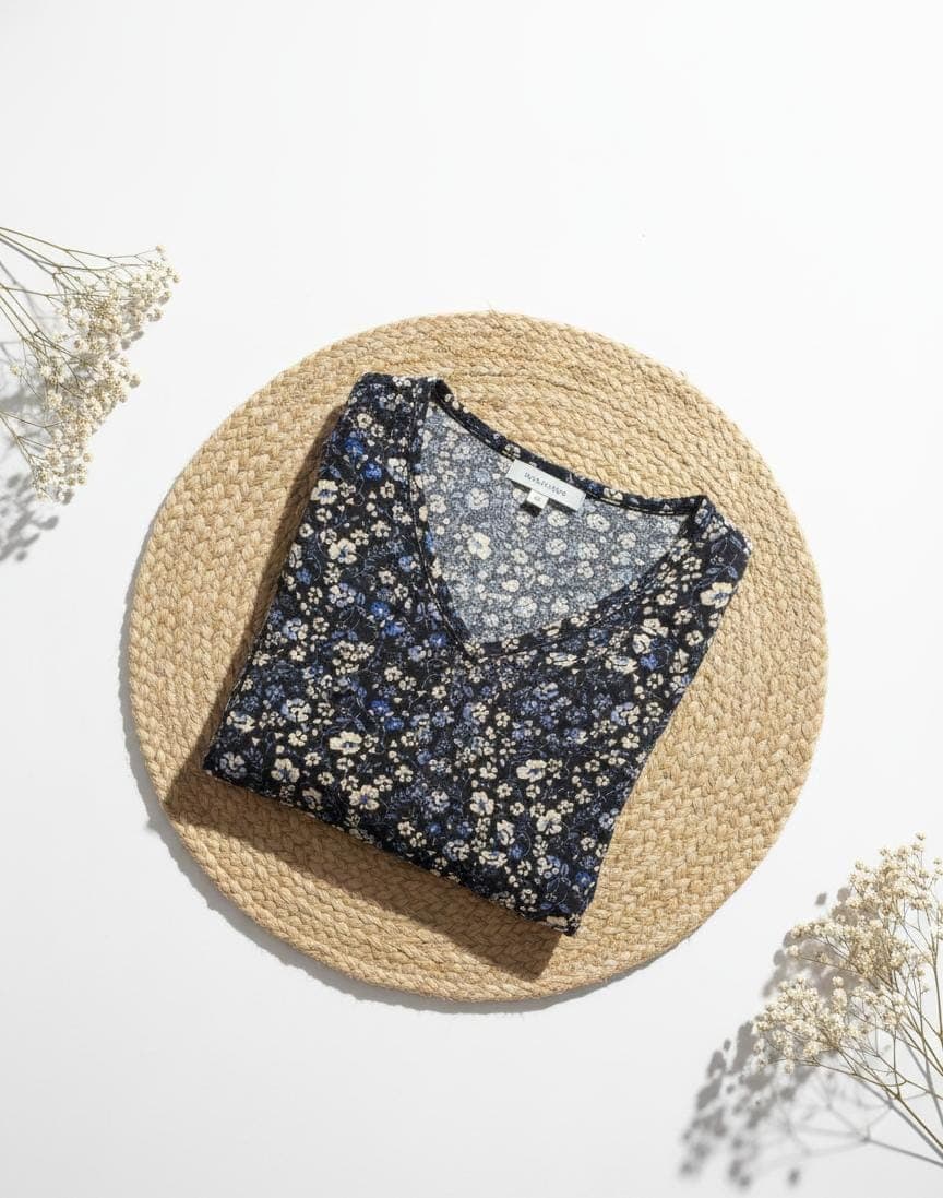 Flat lay view of women’s printed cotton long polo nightdress showcasing fabric texture and design by Irah Vastra