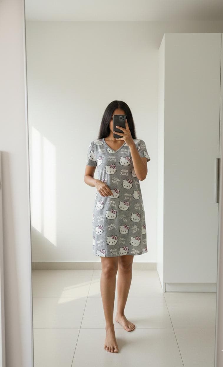Woman wearing grey cartoon print cotton long polo nightdress with V-neck and knee-length fit